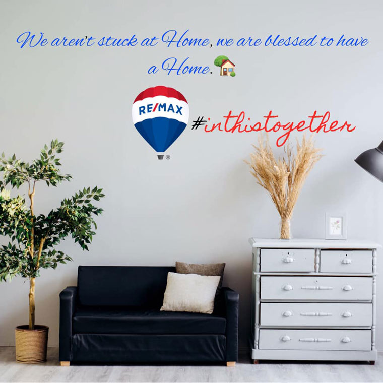 Photo of a home interior with the text "We aren't stuck at Home, we are blessed to have a Home. #inthistogether"