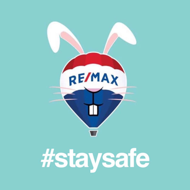 RE/MAX Balloon with a rabbit face and the hashtag #staysafe